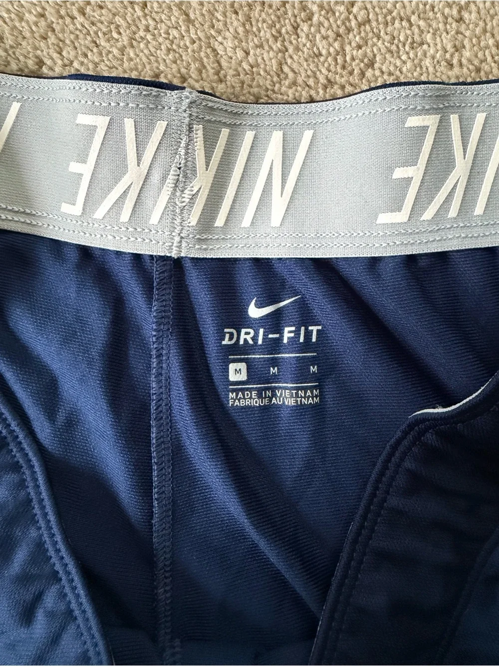 Nike Women’s Dark Blue Athletic Shorts with White Swoosh